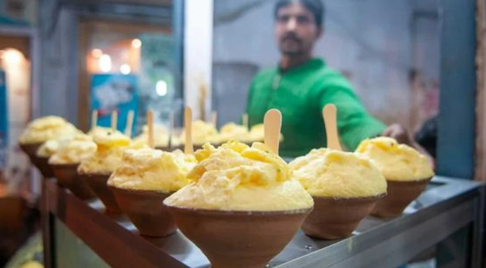 mud kulhads filled with fluffy, light cream from boiled milk and topped with dry fruits
