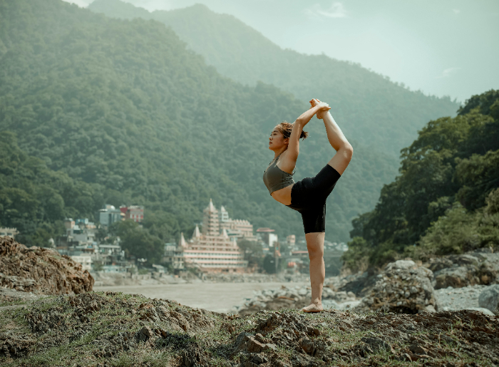 Girl doing yoga in rishikesh